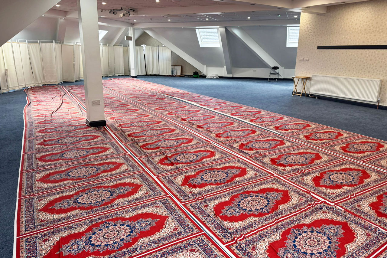 Small hall hire space at Al Hikmah Learning Centre in Bradford with carpeted prayer area suitable for community gatherings and Islamic events.